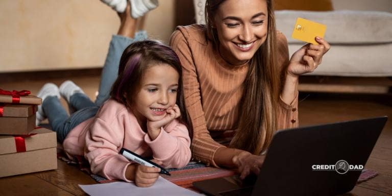 Is FirstCard the Best First Credit Card for Your Teen? A smiling mother and daughter shopping online with a credit card, symbolizing financial education and responsible credit use for kids.